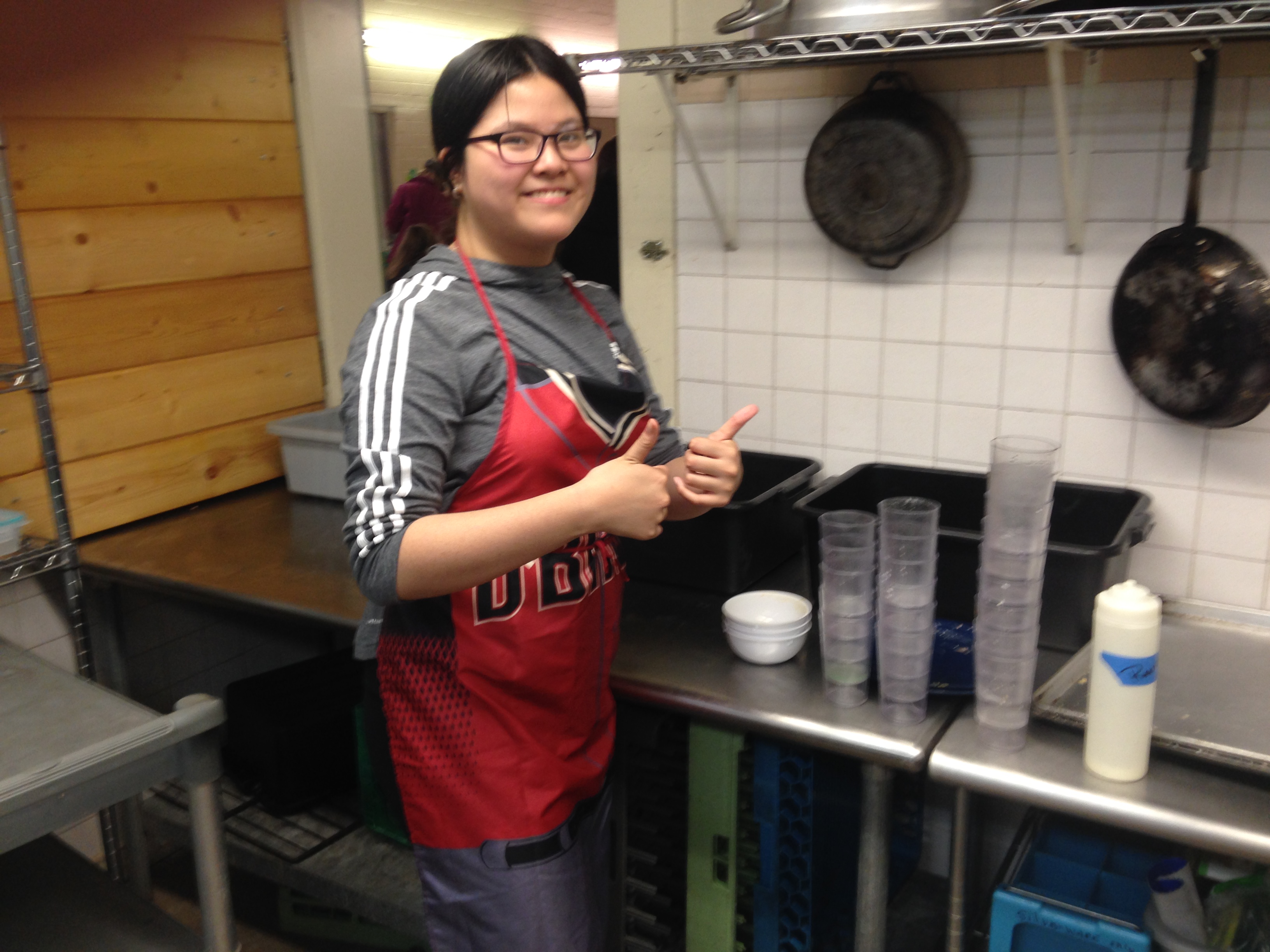 Volunteer in kitchen at Camp Civitan