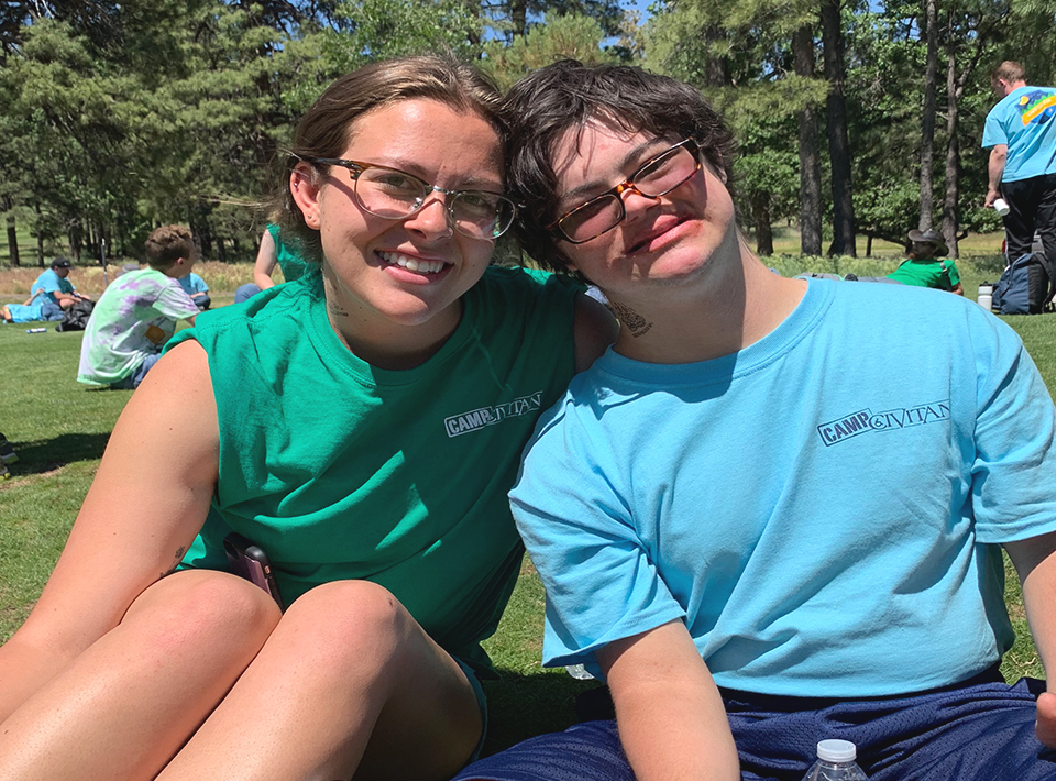 Camp web image - camper and staff Camp Civitan staff member with camper